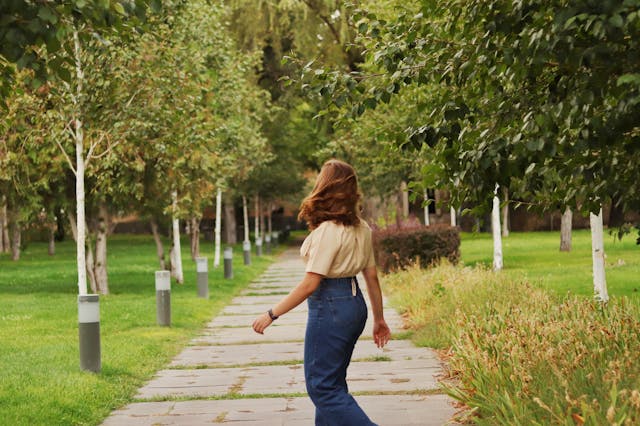 woman walking away